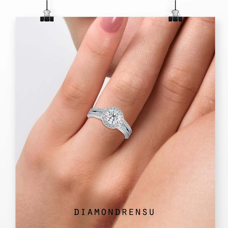 Round cut lab grown diamond in halo setting ring.