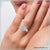 Round cut diamond ring with bezel and split shank design.
 Round cut diamond ring with bezel and split shank design.