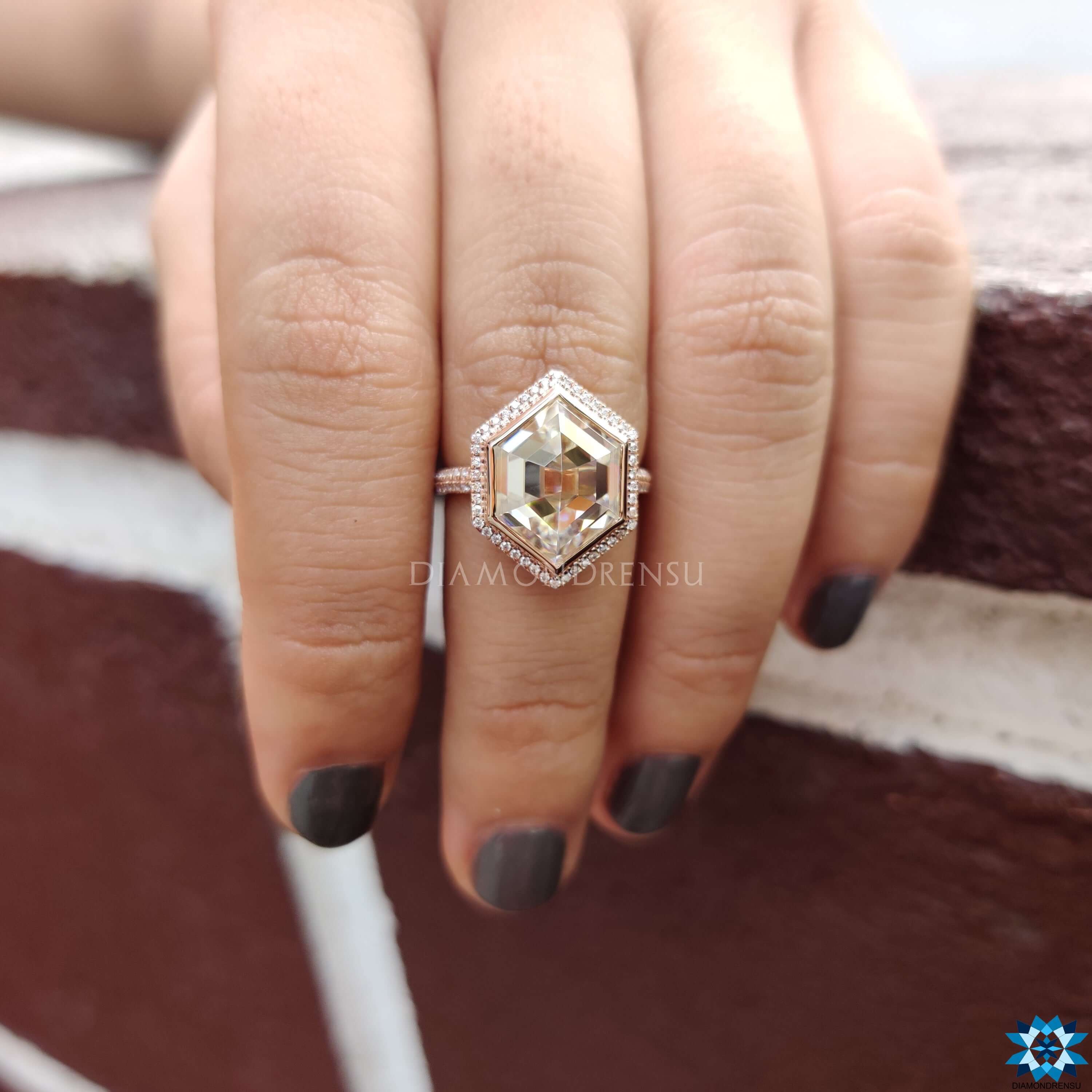 Hexagon cut engagement ring with prong setting.