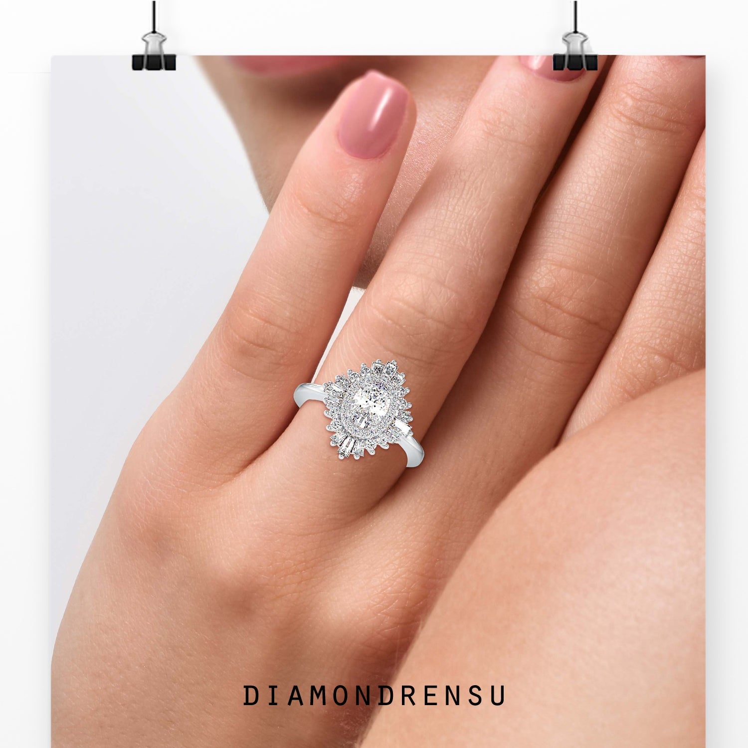 Oval cut diamond ring with tapered baguette halo.