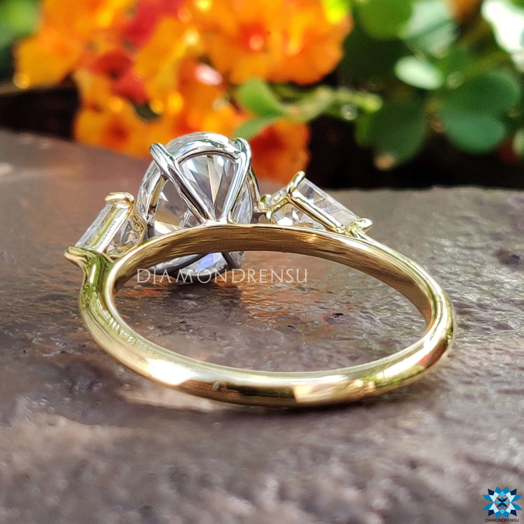 Yellow gold ring with 4 prong setting.