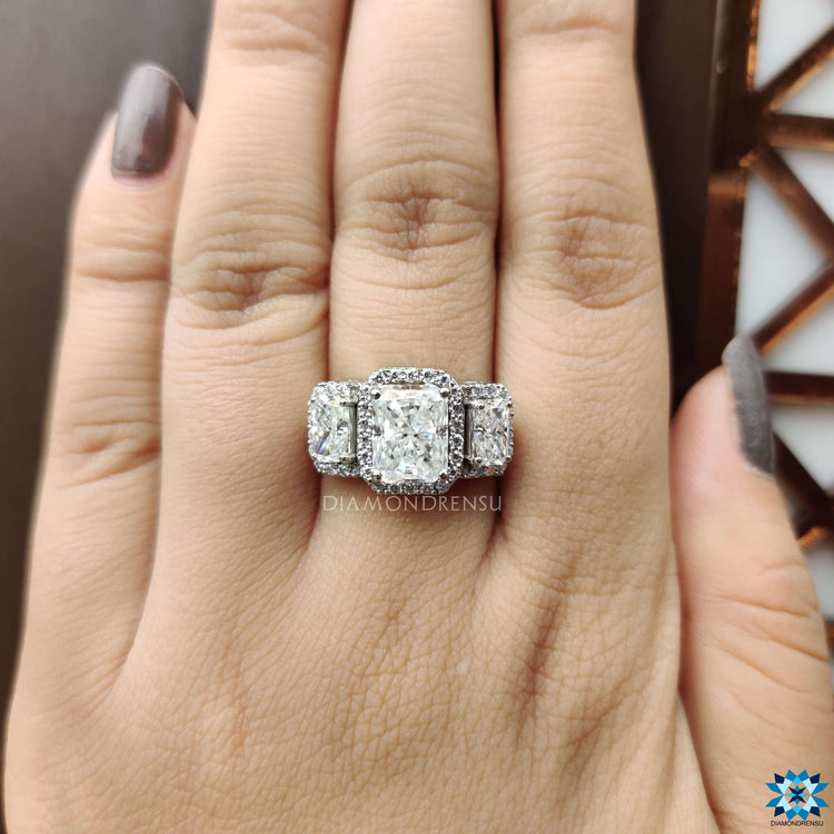 Diamondrensu UK radiant three stone moissanite ring.