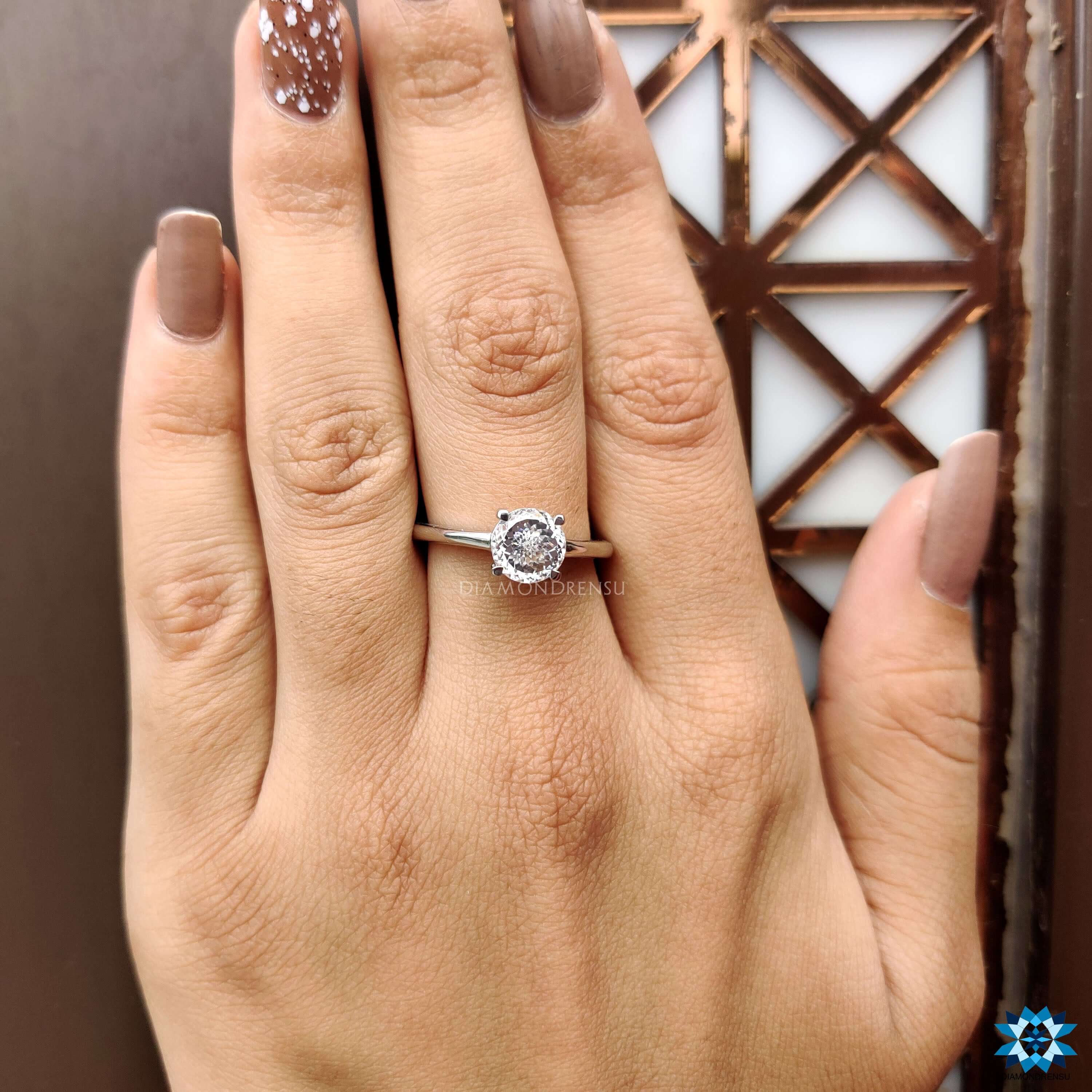 Diamondrensu UK Portuguese cut solitaire ring.