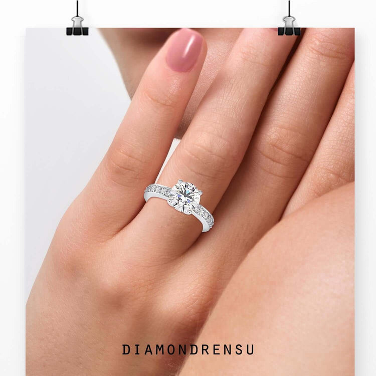 Round cut diamond ring with a 4 prong setting for maximum brilliance.