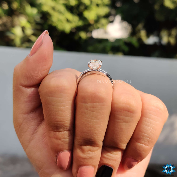 4 claw prong marquise moissanite ring in white gold.