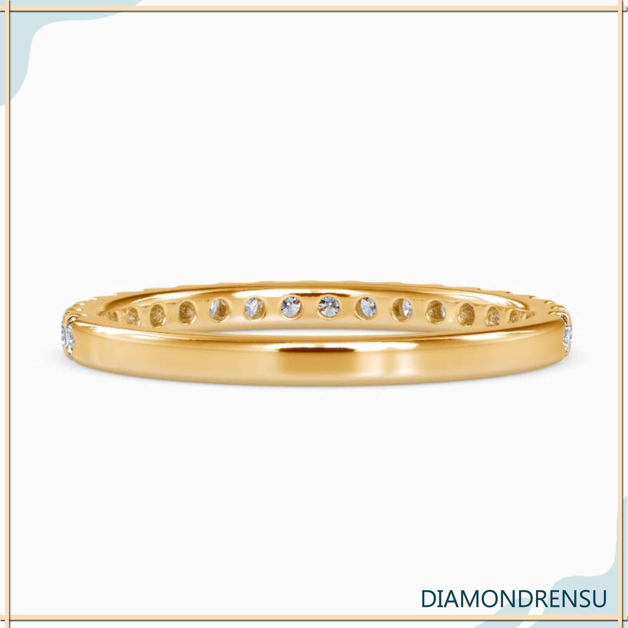 Lab grown diamond ring in half eternity wedding style.