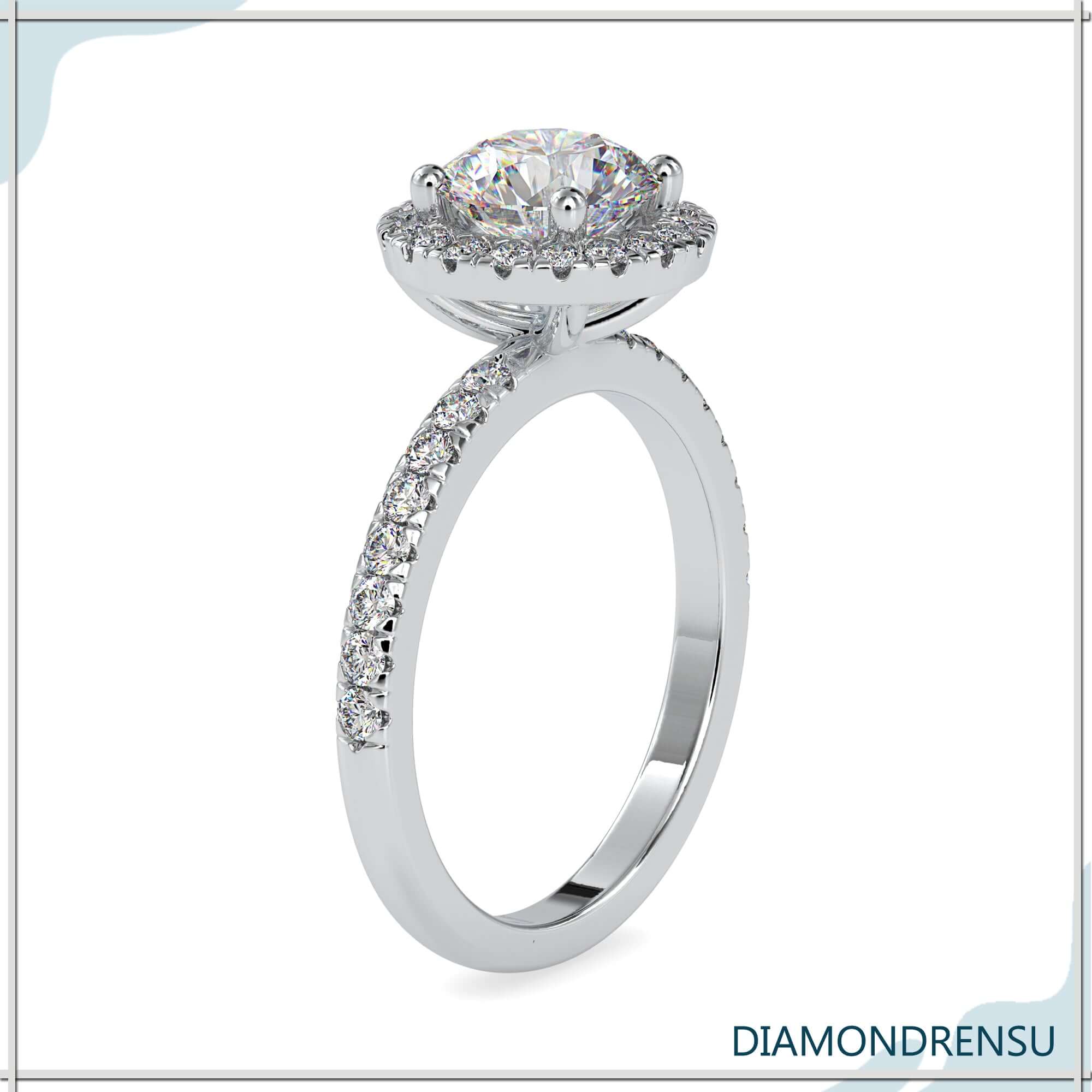 Lab grown diamond ring with pave and halo detail.