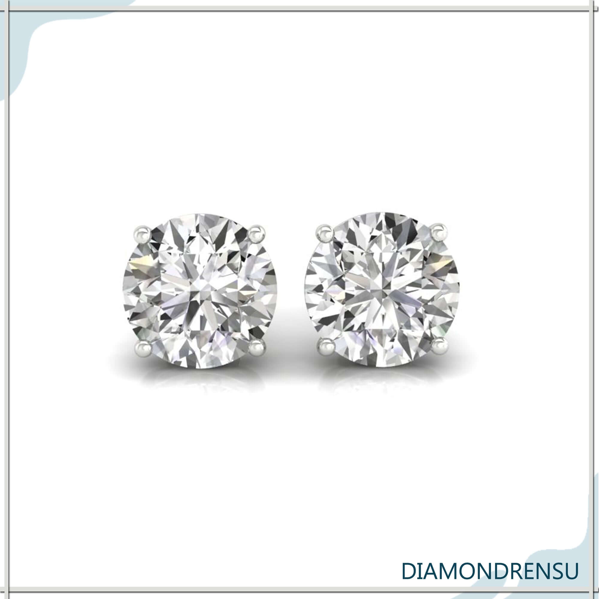 White gold round diamond earrings for everyday wear.