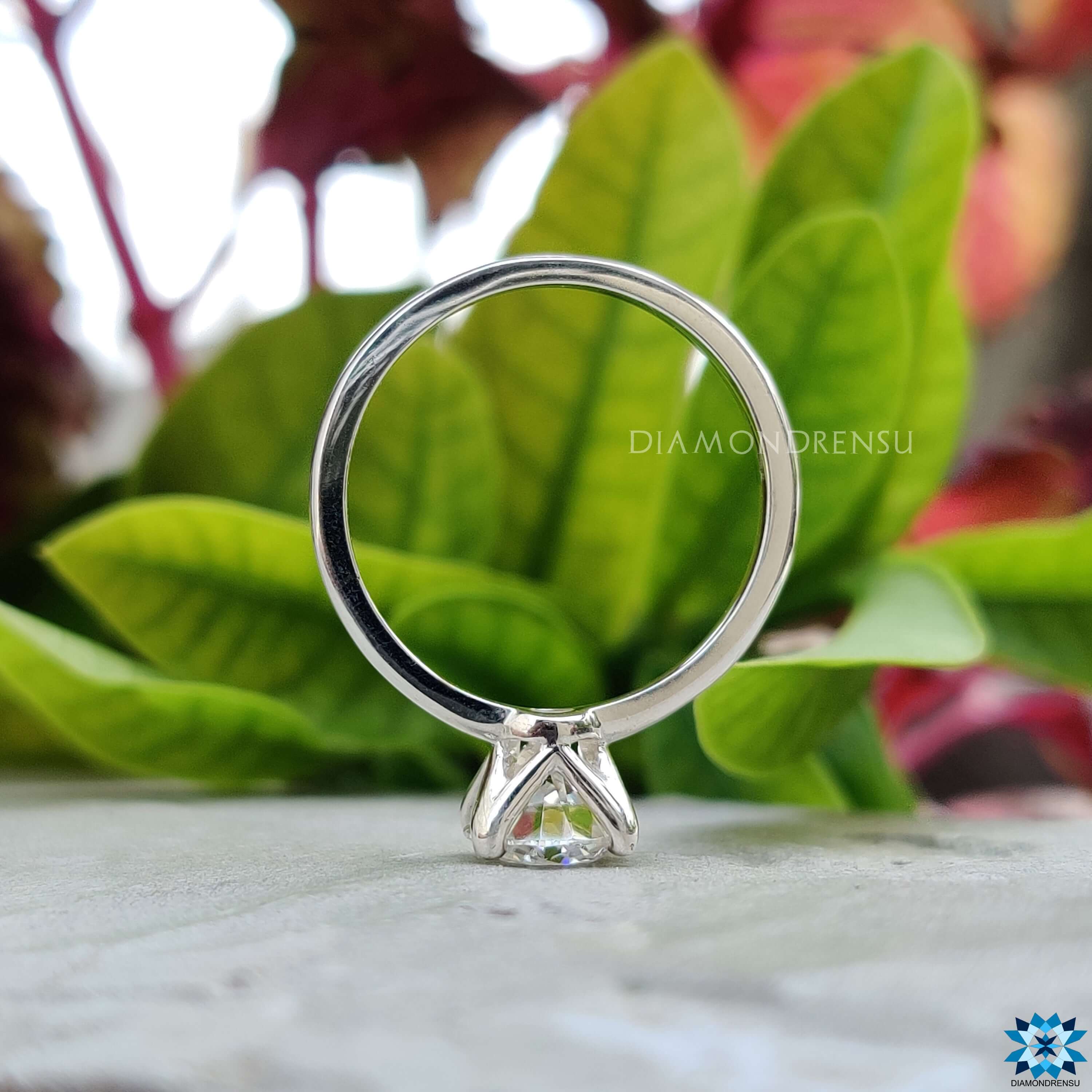 Classic moissanite solitaire ring with prong setting.