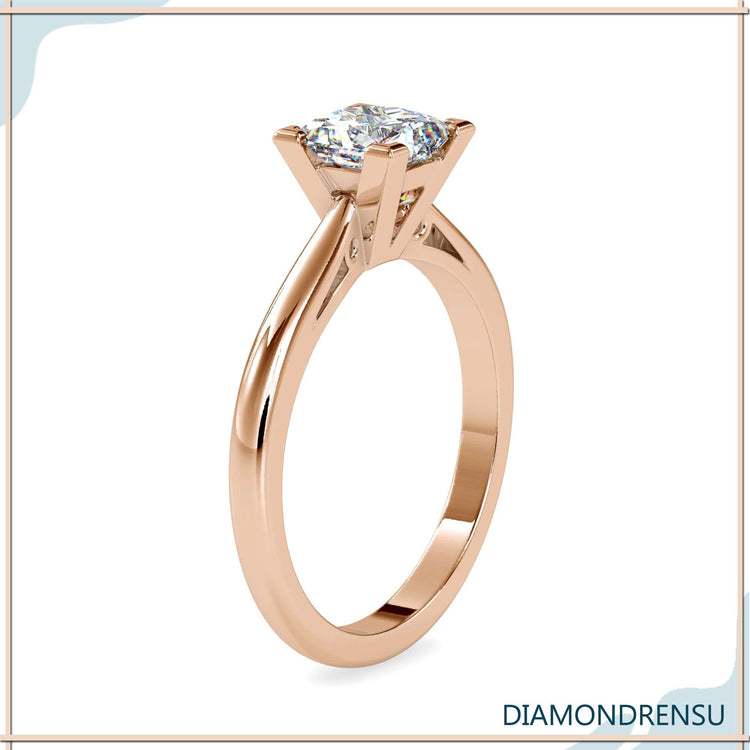 Custom design ring with princess cut diamond and v shaped prongs.