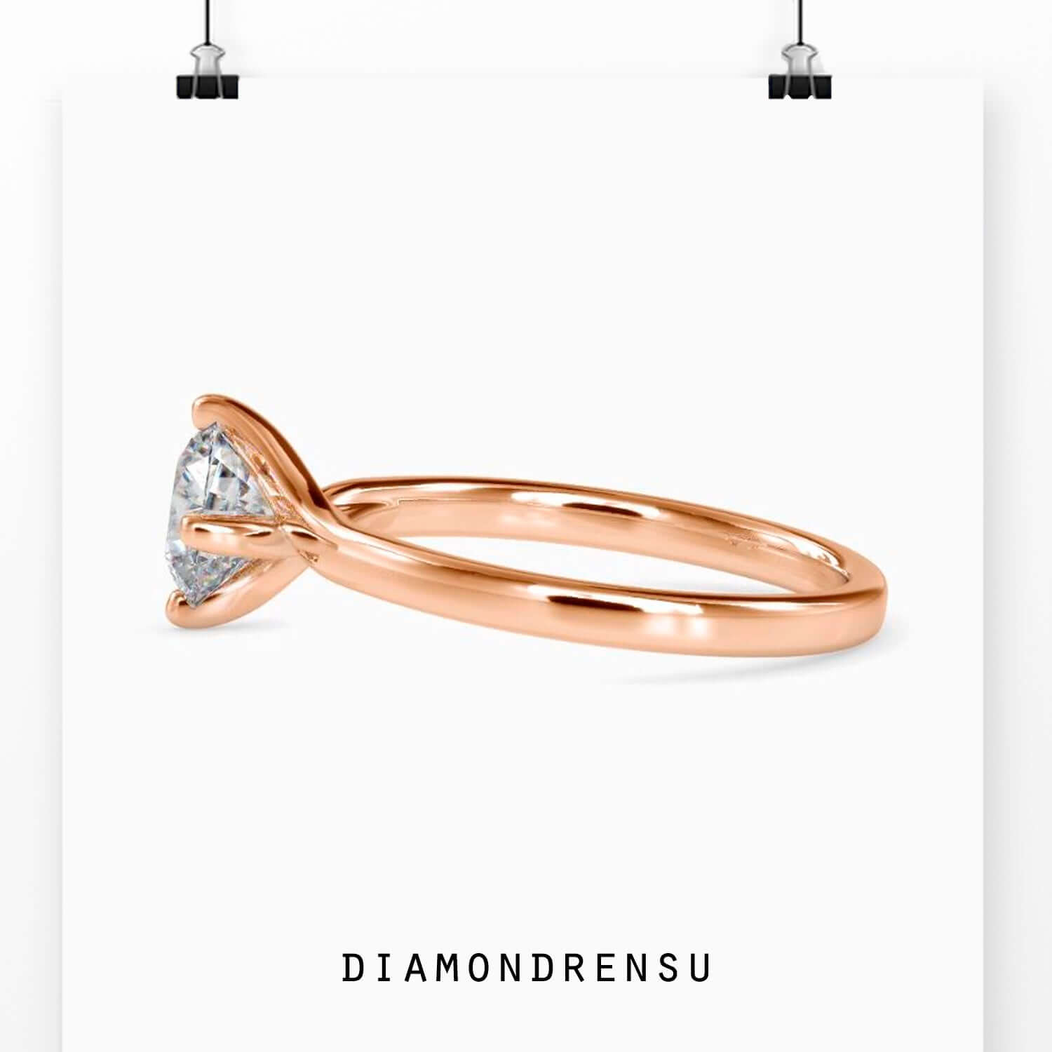 Handmade ring with compass prong round diamond.