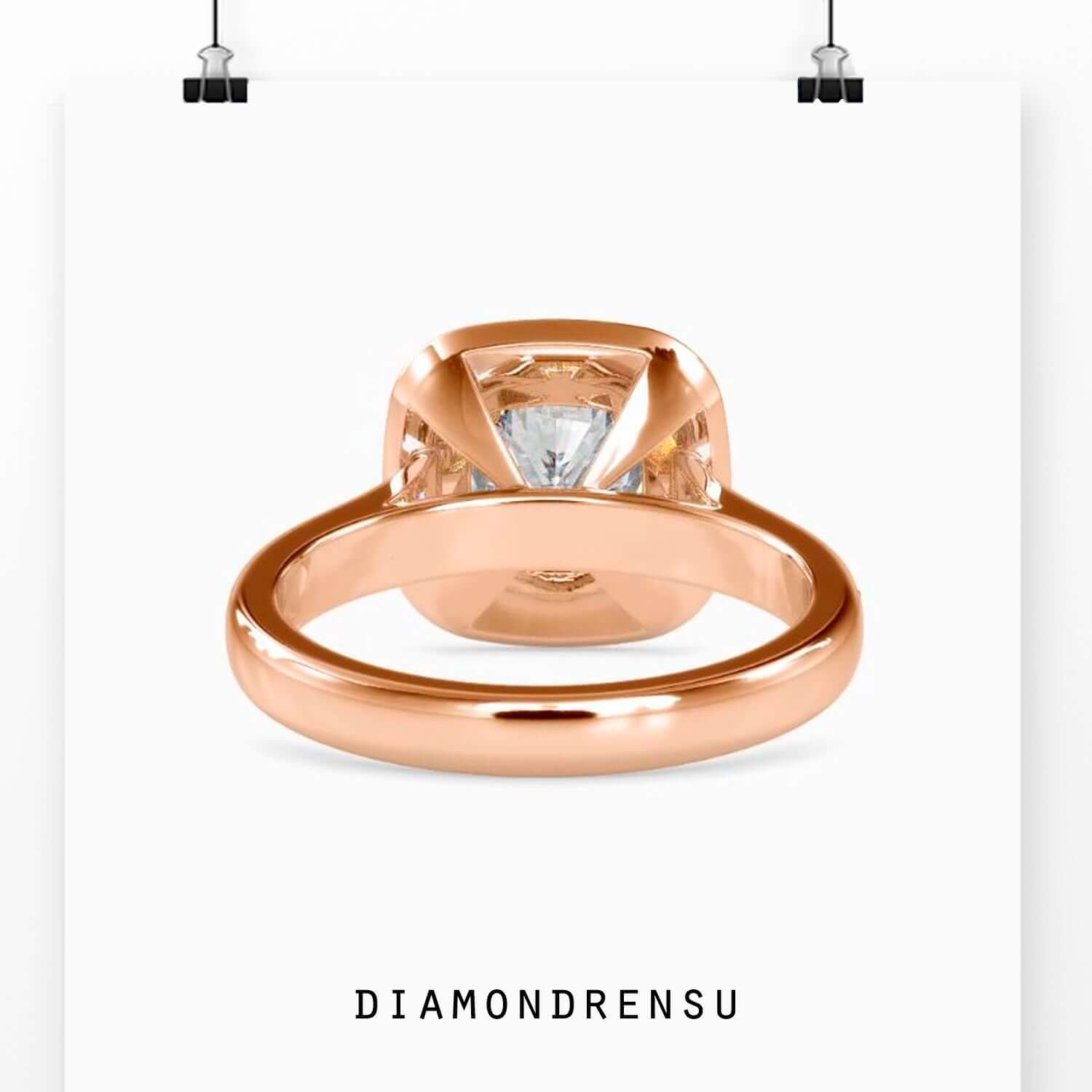 IGI certified cushion halo ring with round cut diamond accents.