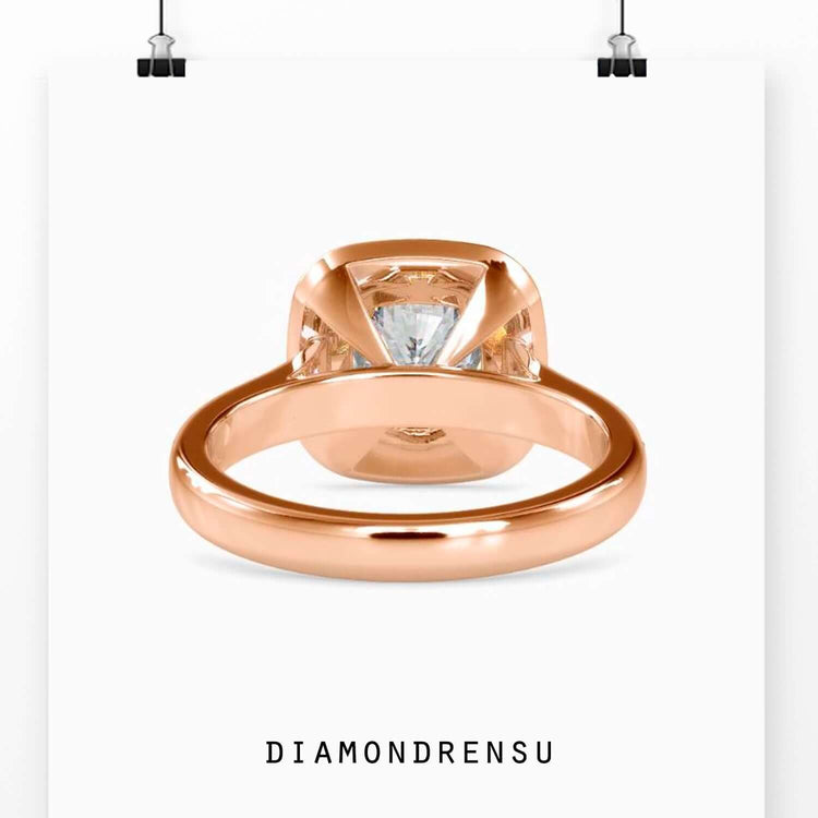 IGI certified cushion halo ring with round cut diamond accents.