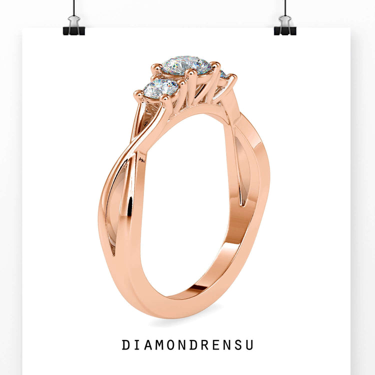 Round diamond infinity ring with prong setting in rose gold.