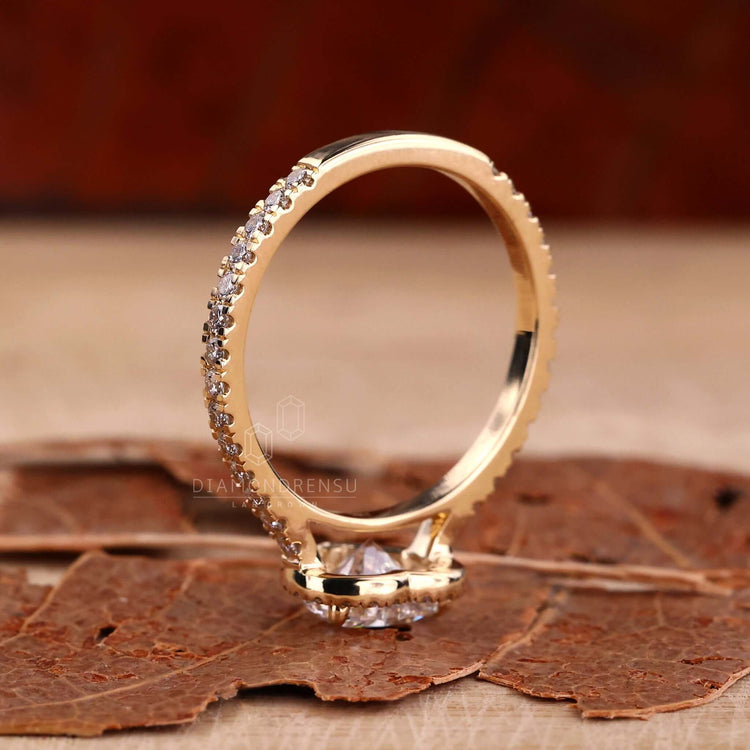 Halo ring setting with pave diamonds and a heart shaped design, perfect as an engagement ring for women.