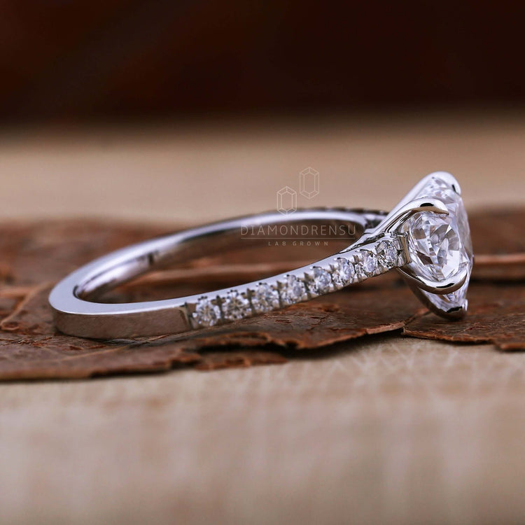 Heart shape ring diamond with pave ring accents and handmade jewelry crafted for timeless sophistication.