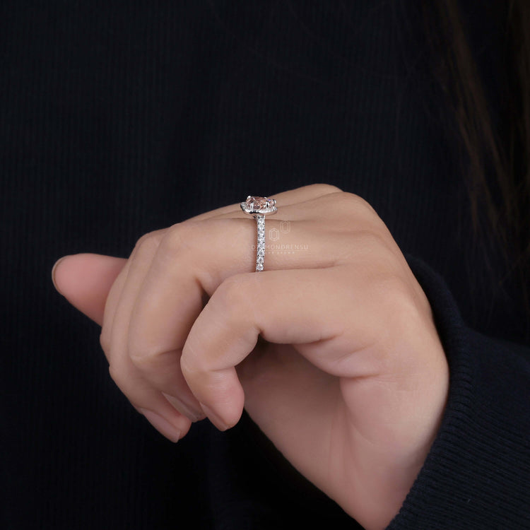 Pave ring designed with intricate detailing and a unique cathedral setting