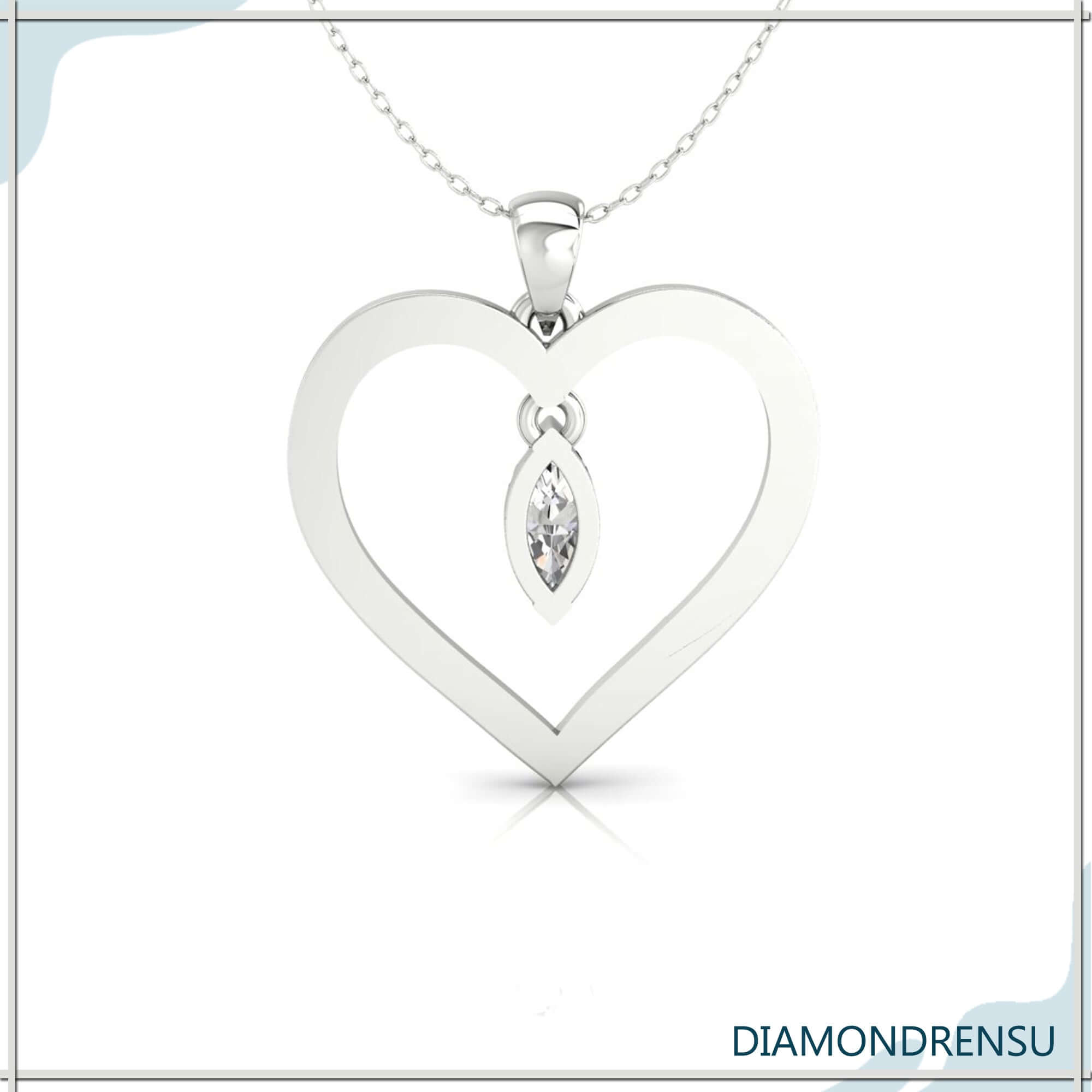 White gold pendant with heart frame and lab grown diamond.