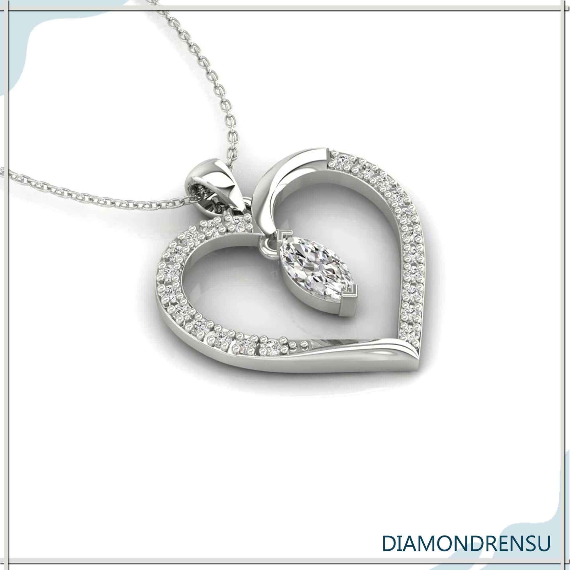 Round cut heart shape outline pendant in rose gold finish.