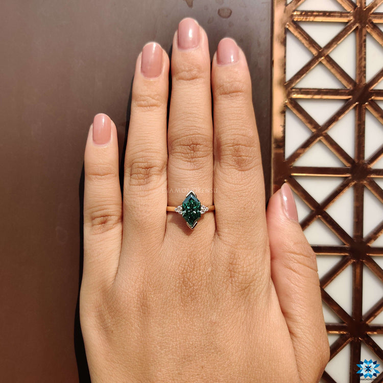 Unique custom ring featuring a Dutch marquise moissanite in prong setting.