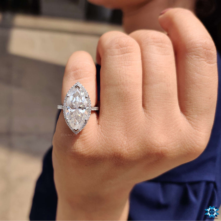 Bridge accent ring with hidden accent stones.
