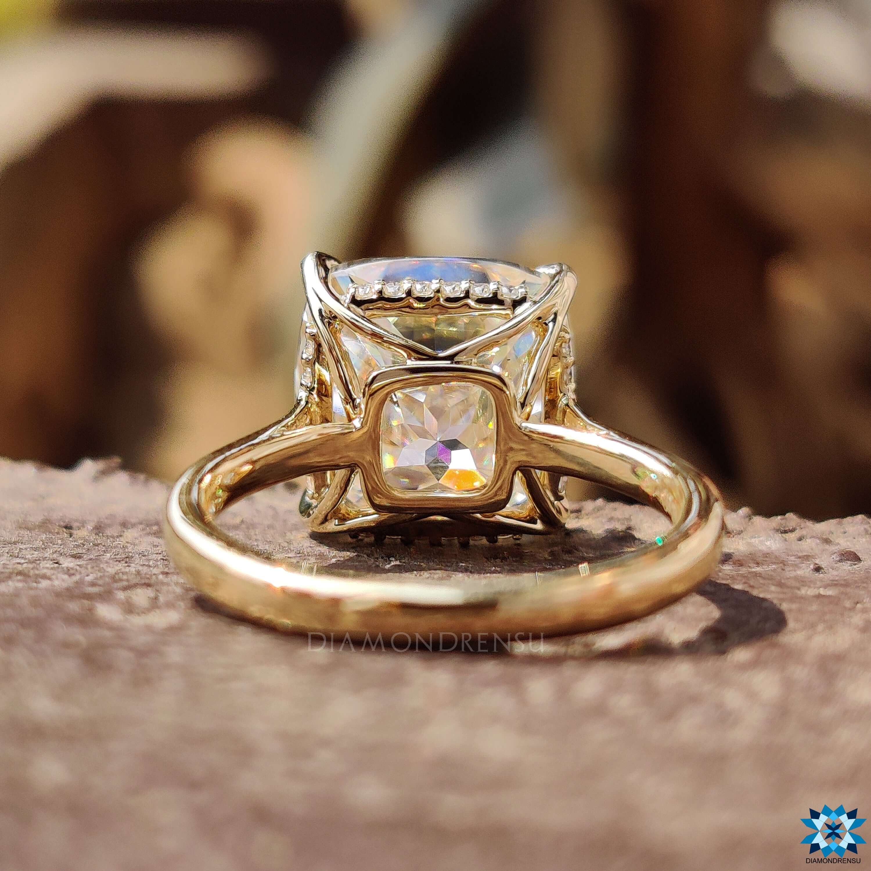 Custom yellow gold ring with cushion Rensu cut center stone.