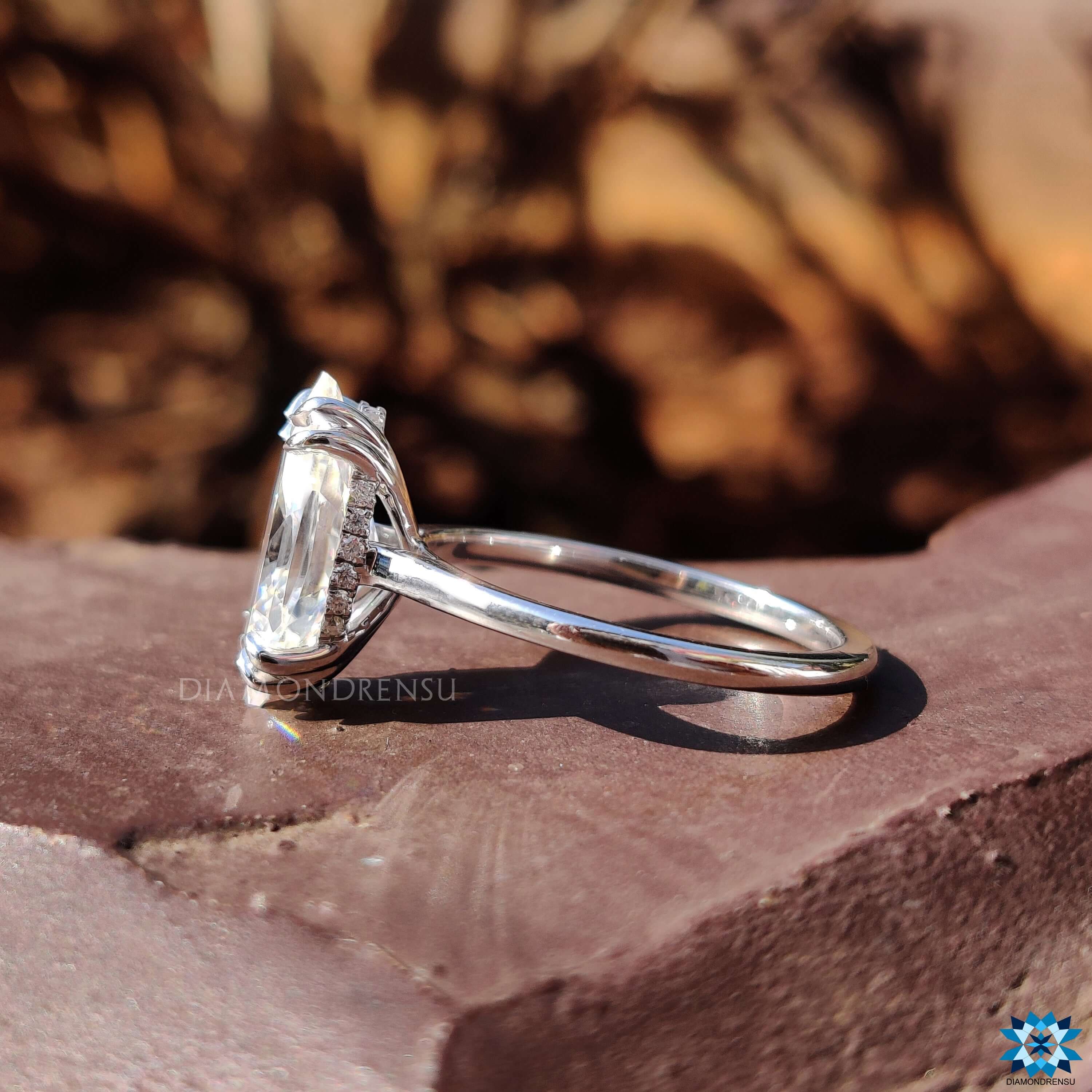 Round cut hidden halo setting in moissanite ring.
