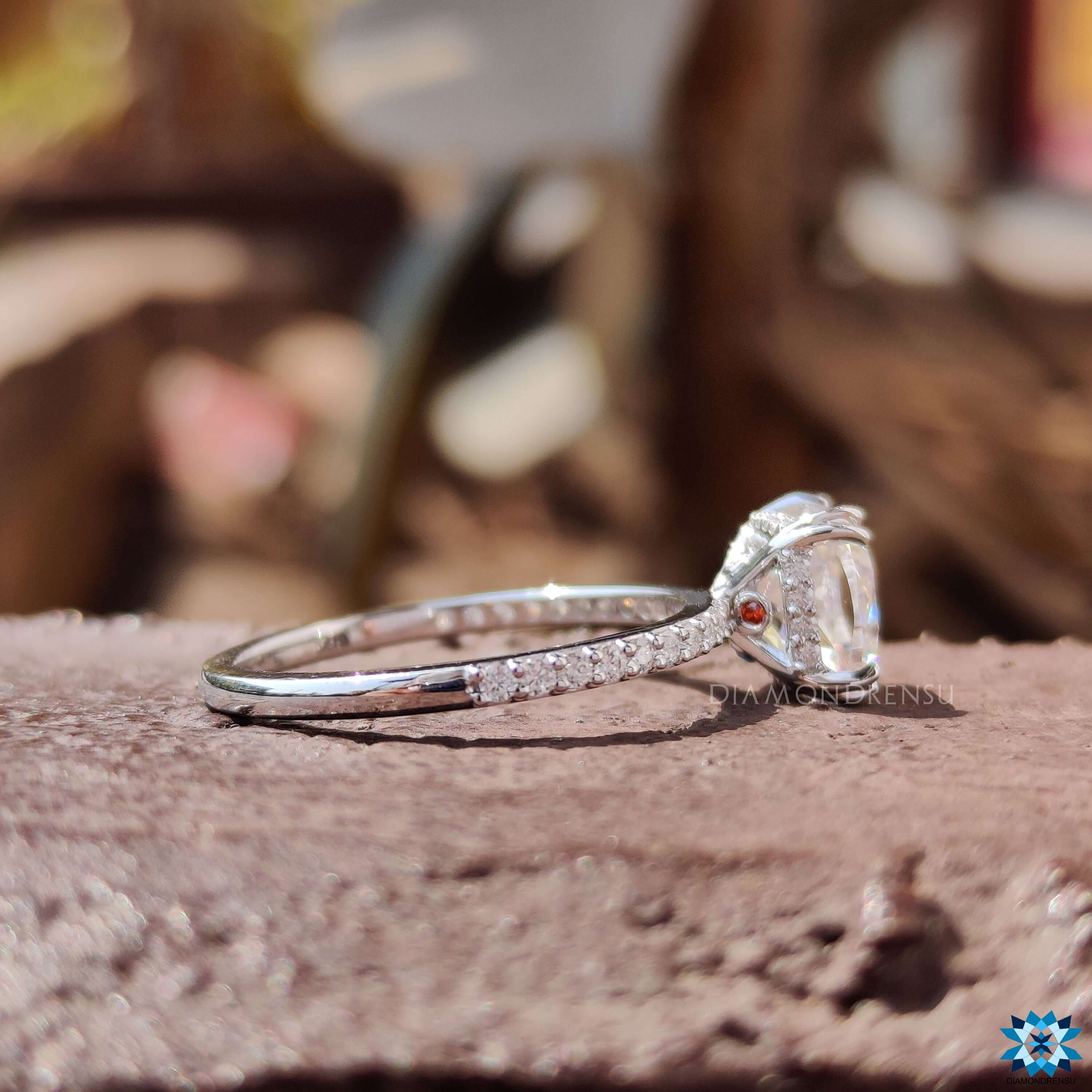 Hidden halo moissanite ring with pave setting band.