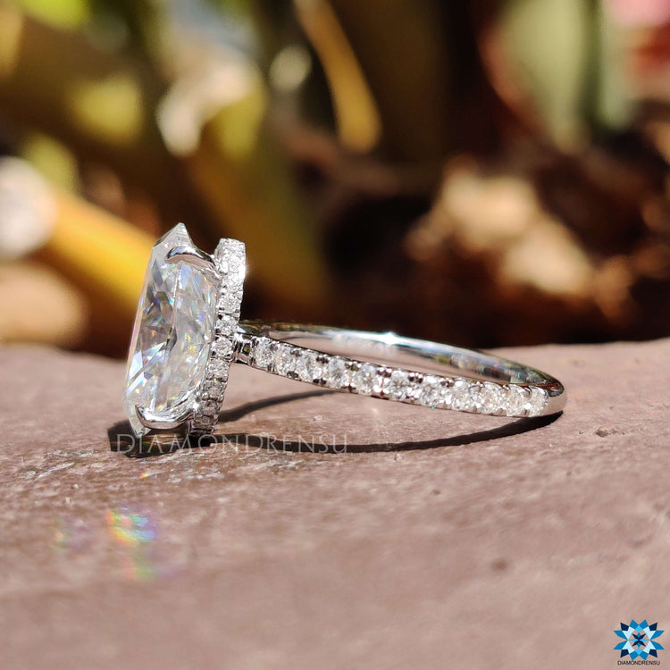 Pave setting ring featuring round cut pave band.