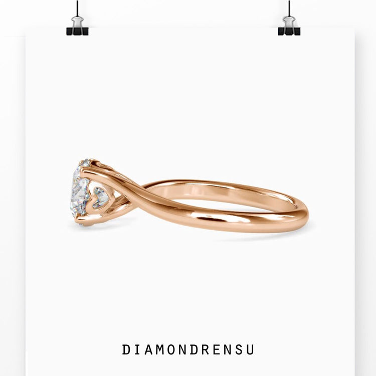 Yellow gold engagement ring with solitaire round diamond.