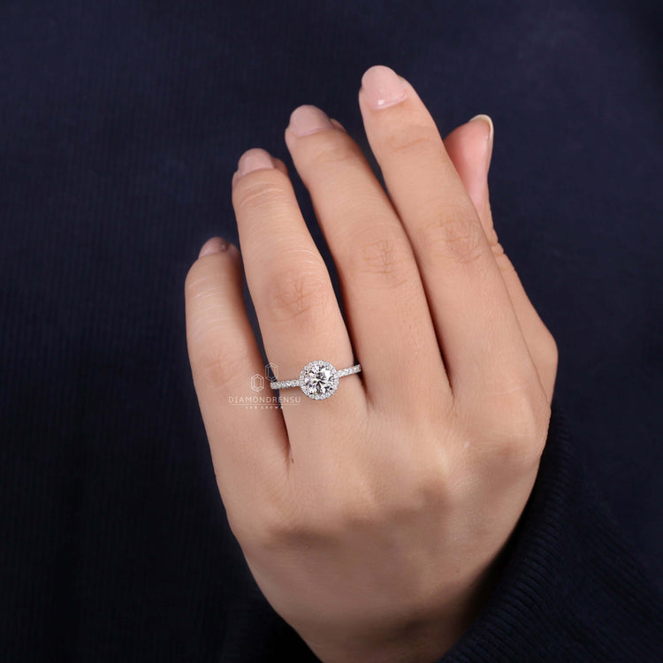 White gold engagement ring with a 2 carat round diamond