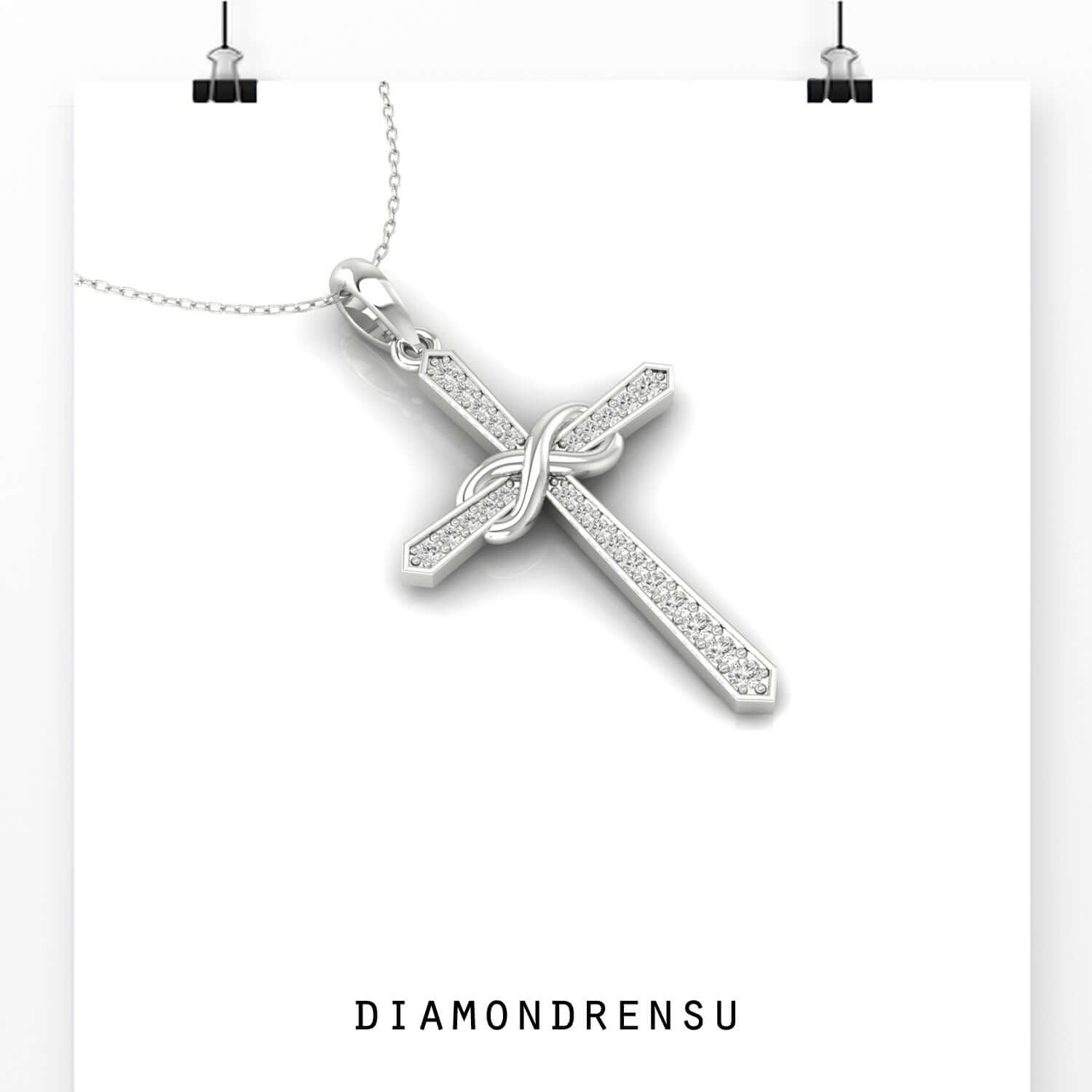 Infinity pendant with lab grown diamond centre.