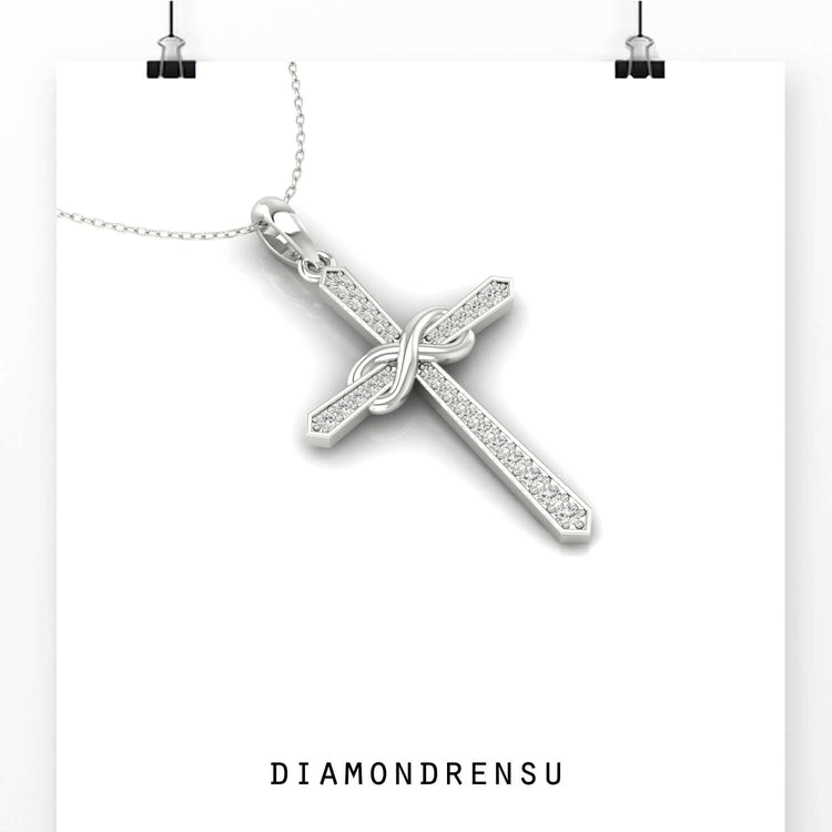 Infinity pendant with lab grown diamond centre.