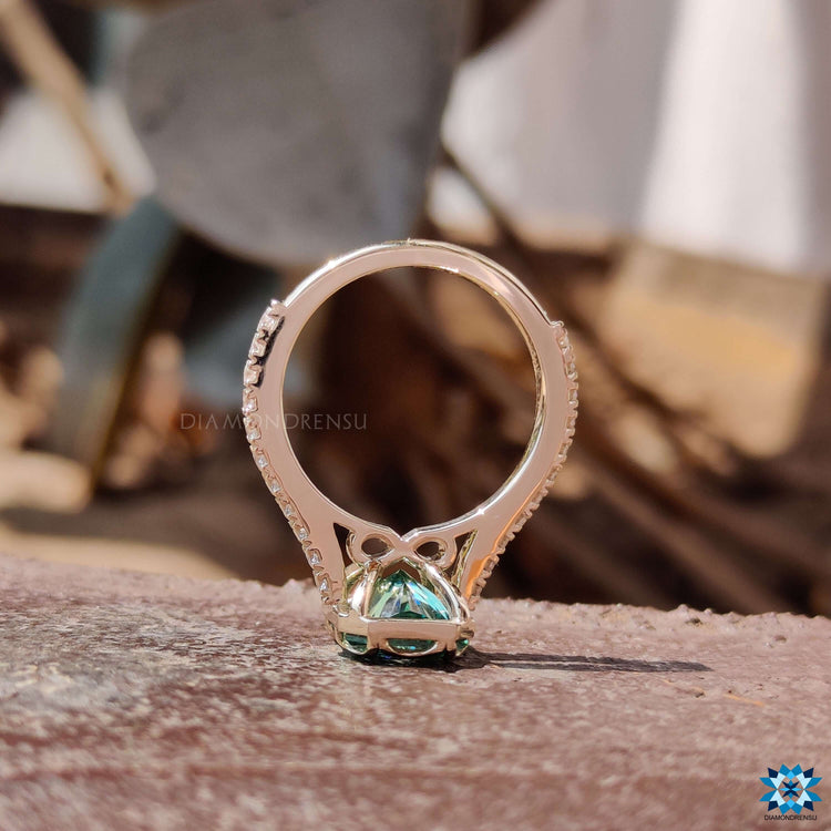 Round cut pave band with radiant green moissanite.