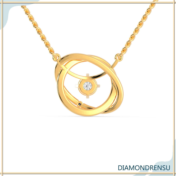 Lab grown diamond pendant featuring interlocking gold circles.