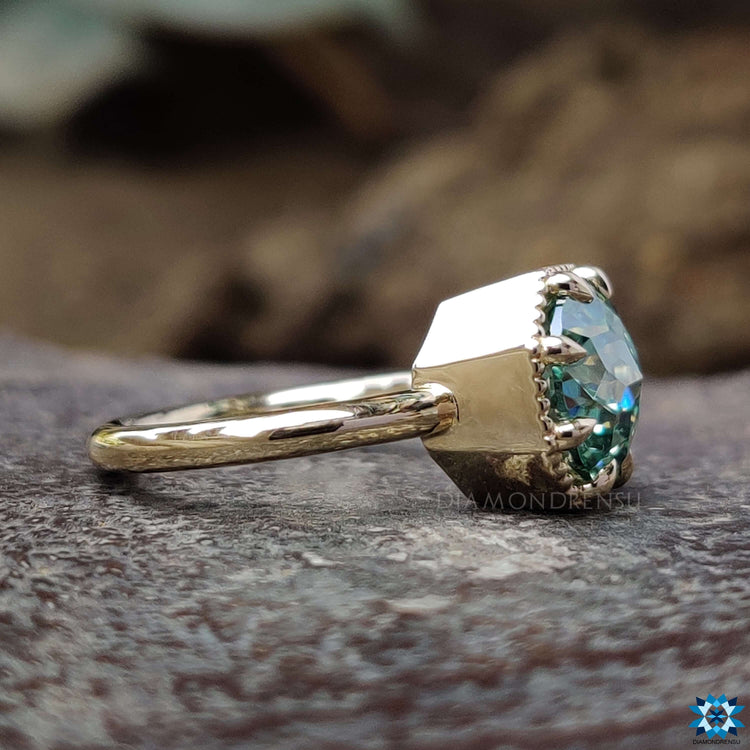 8 claw prong yellow gold solitaire ring.