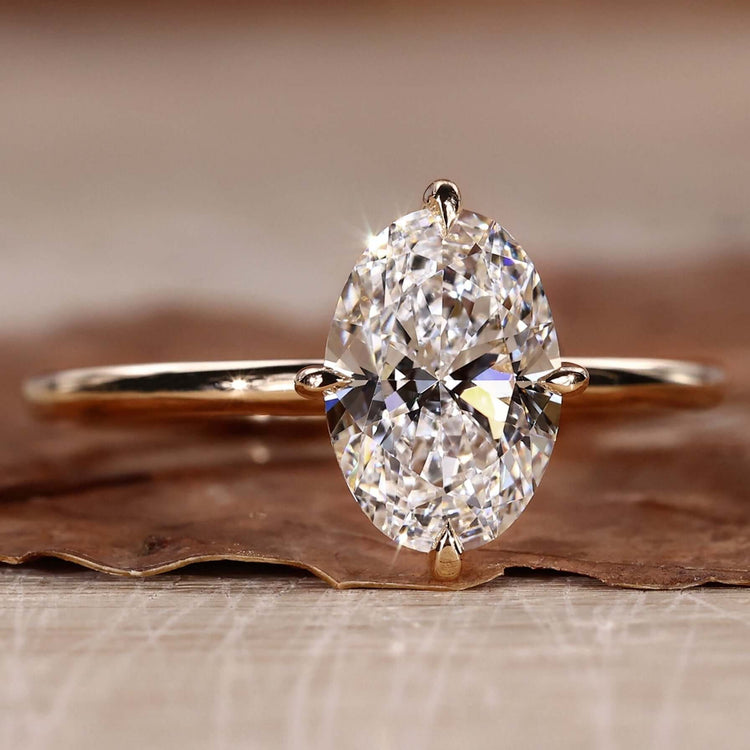 Oval diamond engagement ring in a timeless design for women.
