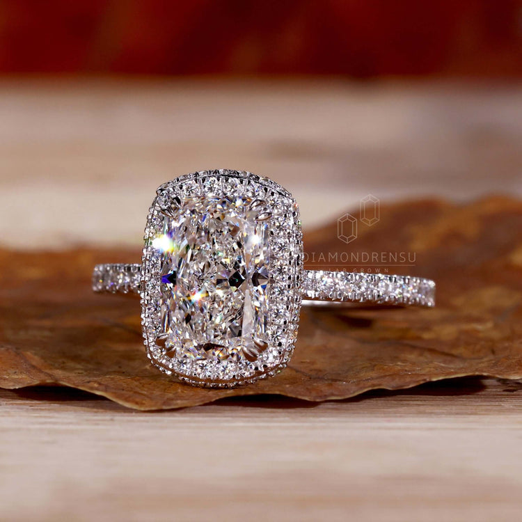 Halo ring with double halo setting crafted in handmade jewelry for a unique engagement ring.