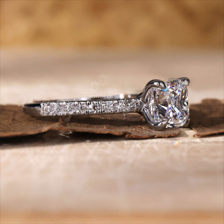 Cushion cut ring crafted with exquisite pave diamonds and an igi certified Lab Grown Diamond for sustainable luxury.