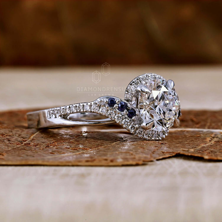 Round ring diamond paired with a bypass engagement ring.