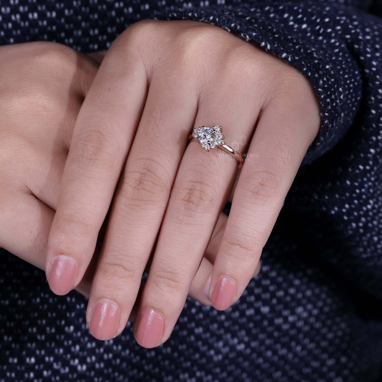 Beautiful cluster ring engagement with delicate craftsmanship.