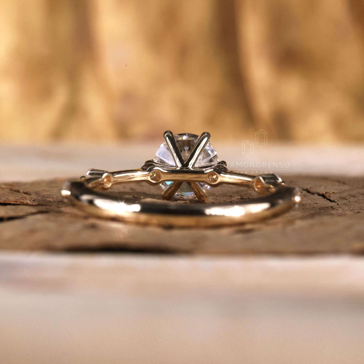 Engagement ring pave with intricate design for added charm.