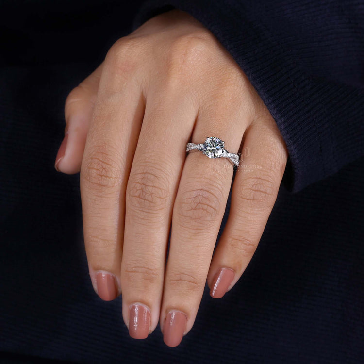 Round diamond ring featuring a handmade jewellery design.