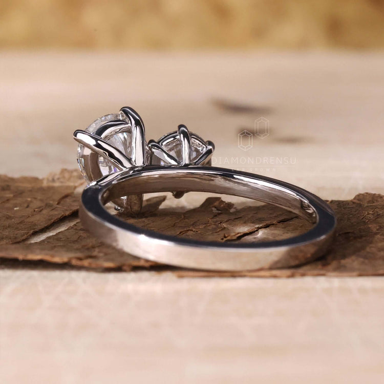 Cushion cut engagement ring in a 4 prong claw setting, ideal for proposals or as a UK engagement ring.