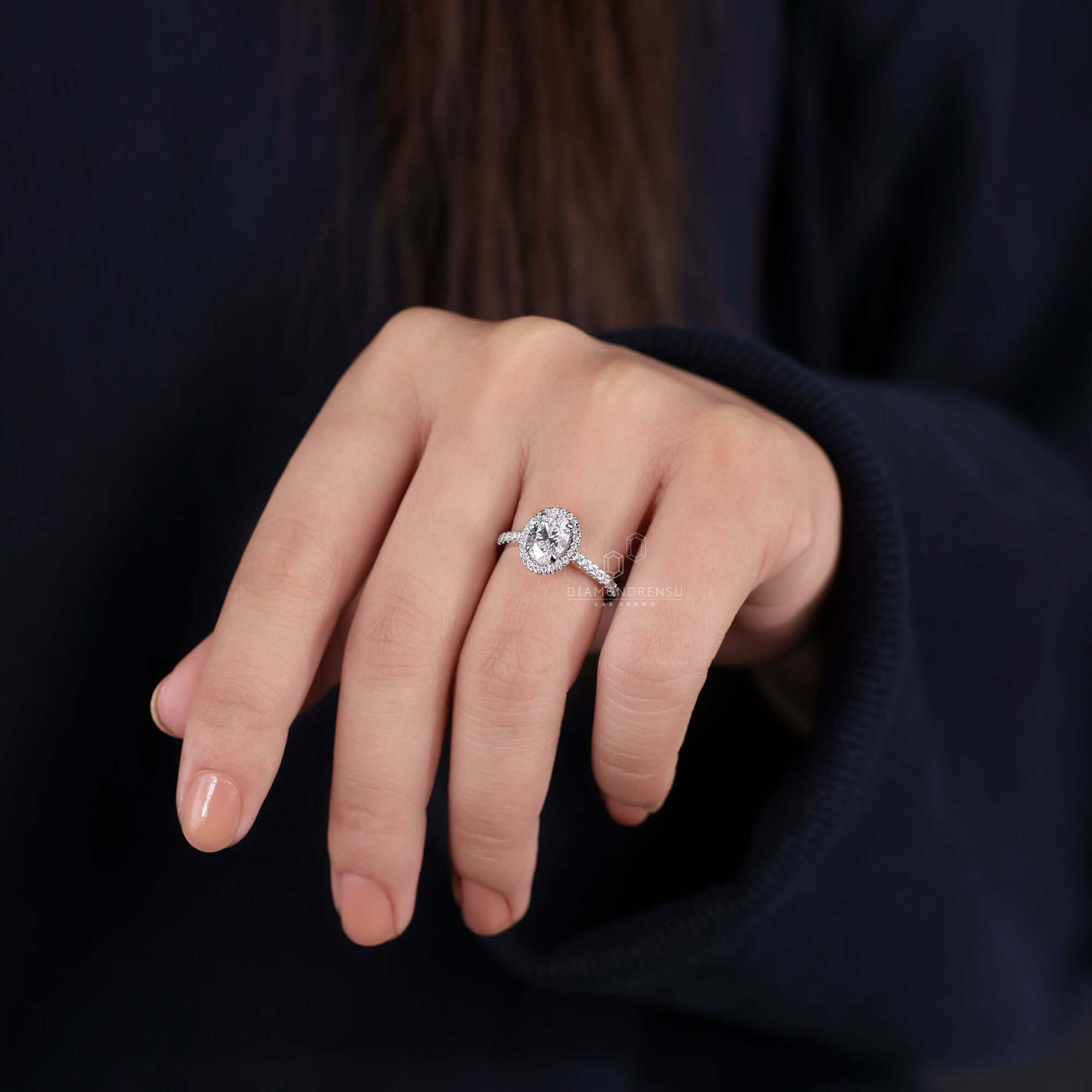 Handmade jewellery showcasing a 4 prong claw setting oval ring.