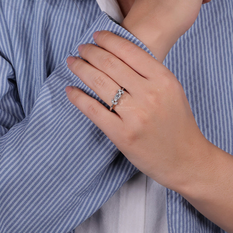 Tapered ring shank design in an antique engagement rings UK style.