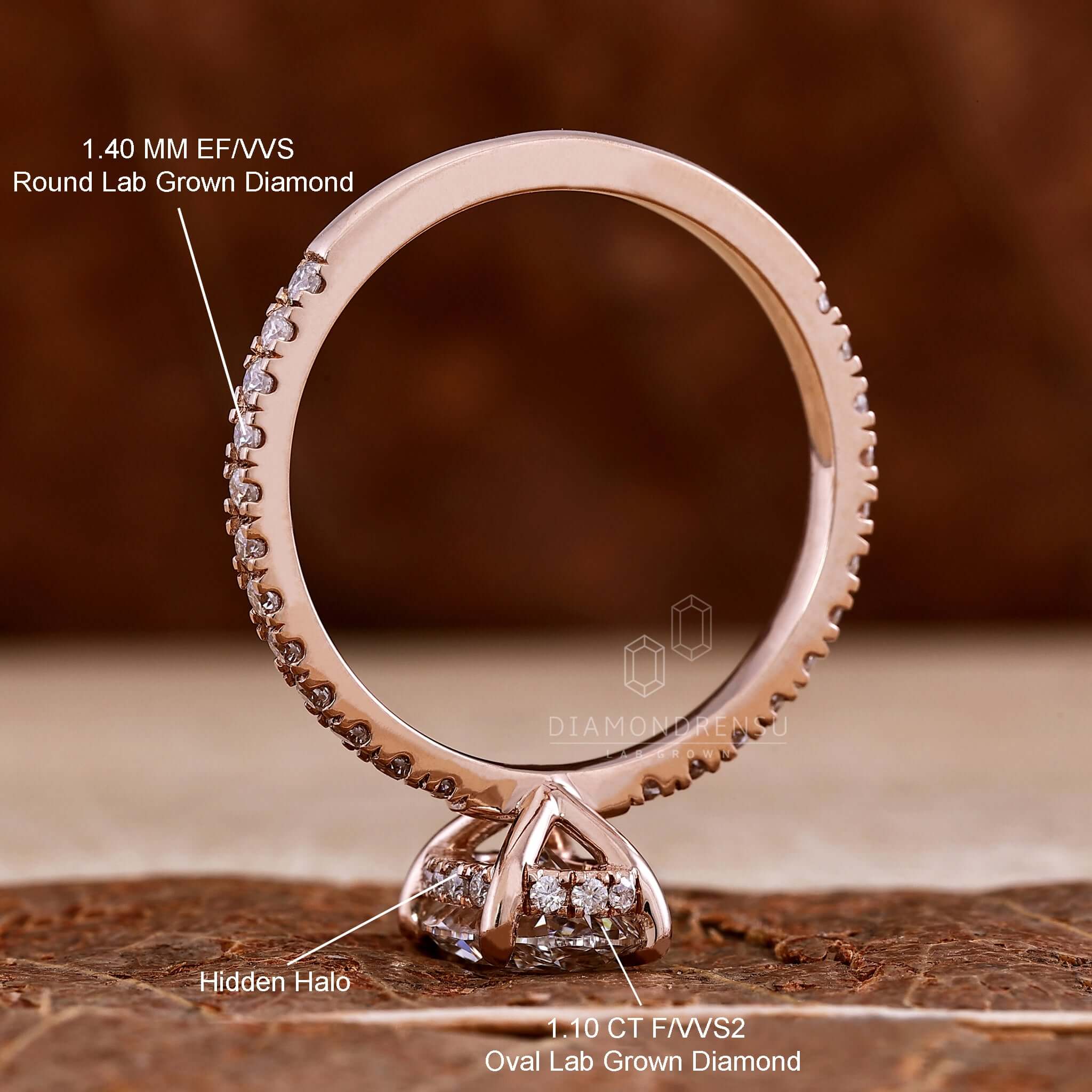 Unique engagement ring with oval diamond, hidden halo, and pave setting for a modern and elegant look.
