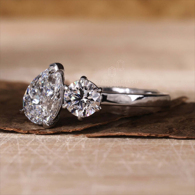 Cushion engagement ring featuring a solitaire diamond in a claw prong setting, designed for everlasting beauty and charm.