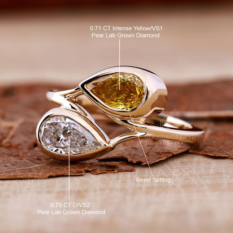Handmade bezel pear ring crafted with lab grown diamonds.