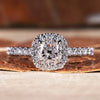 Cushion cut engagement ring with a halo setting for elegance